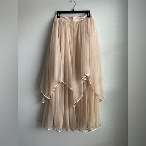 Blush free people tulle skirt.